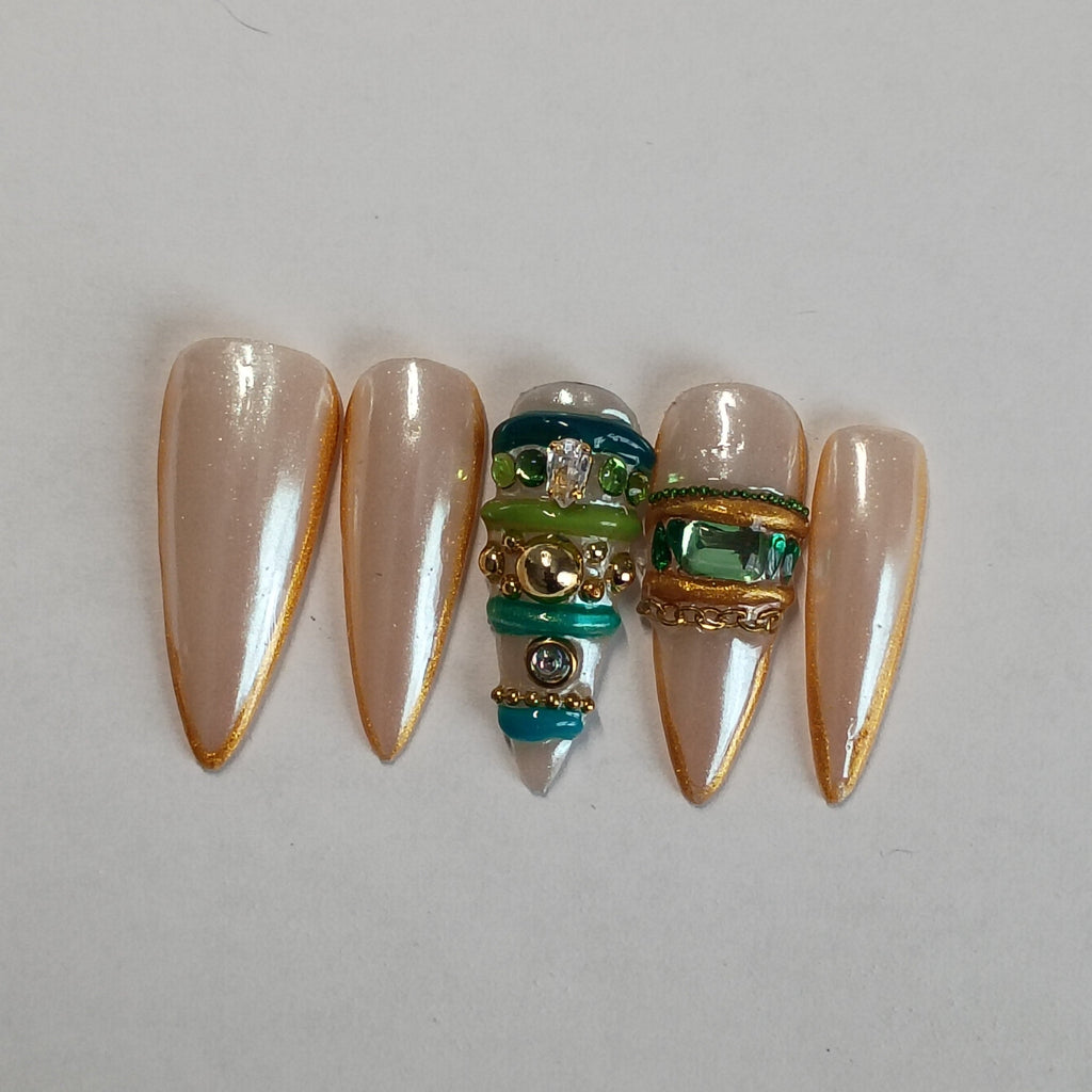 Elegant Chrome Bangle Stiletto Nails with Gold Trim