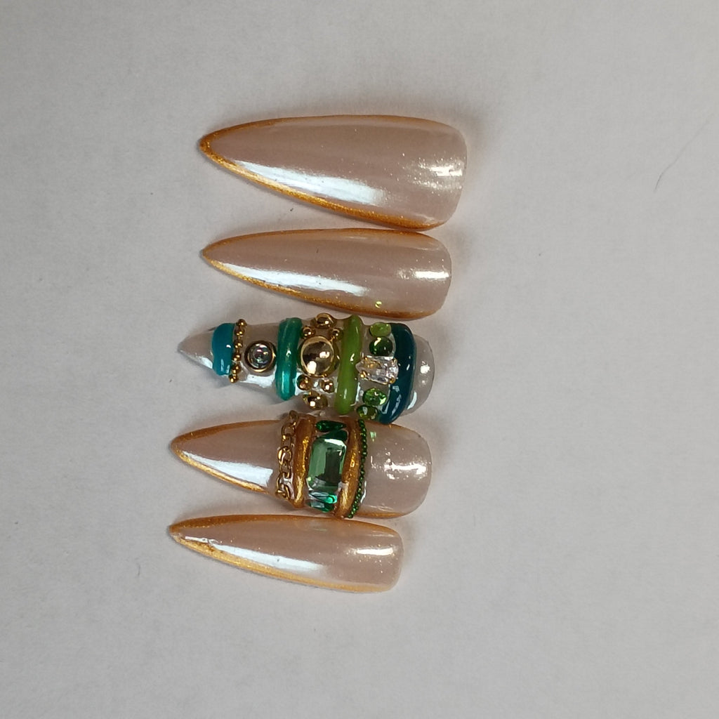 Elegant Chrome Bangle Stiletto Nails with Gold Trim